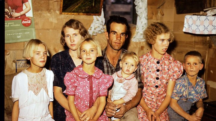 Family photos shown one after another, like a film